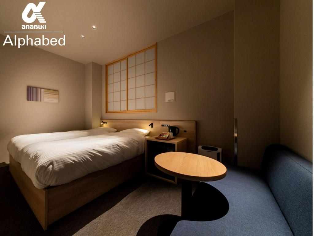 Giường trong phòng chung tại ALPHABED INN Fukuoka Ohori Park / Vacation STAY 65802