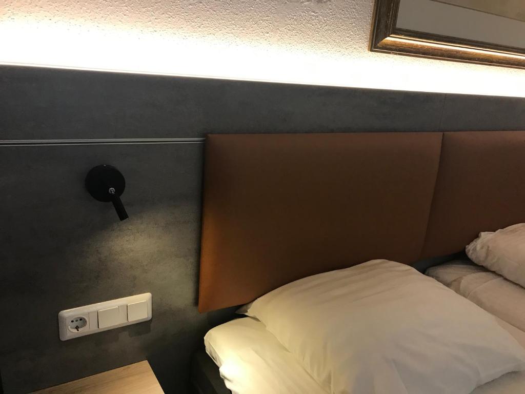 Postel nebo postele na pokoji v ubytování Hotel De Weyman