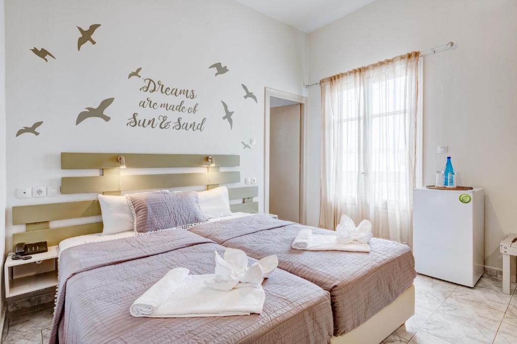 Postel nebo postele na pokoji v ubytování Hotel Kamelo