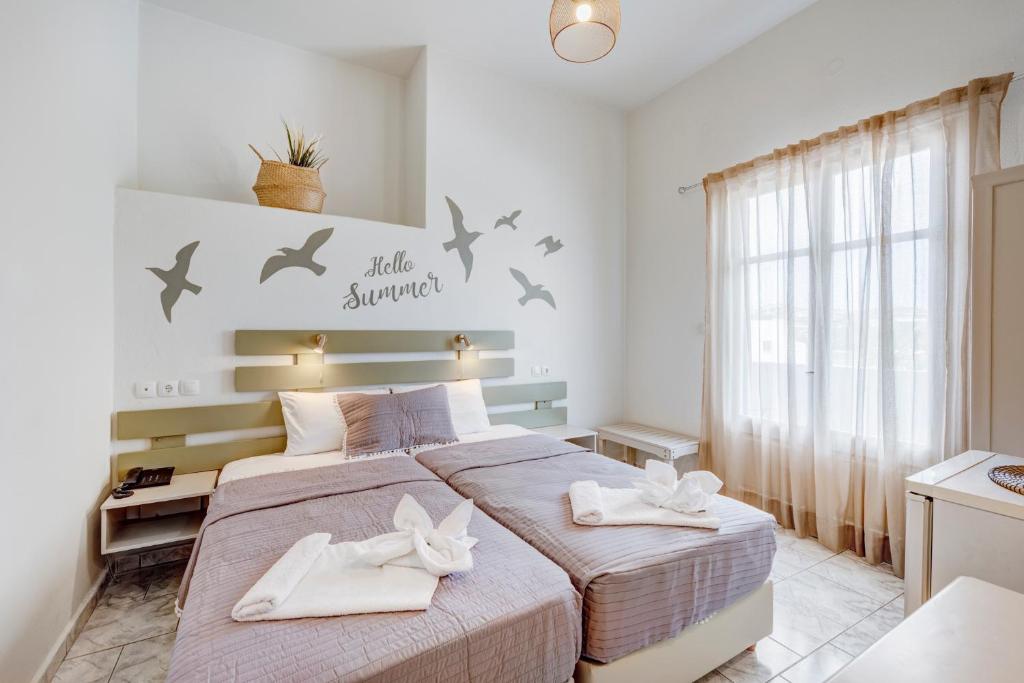 Postel nebo postele na pokoji v ubytování Hotel Kamelo