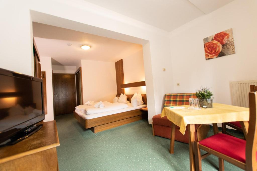 Postel nebo postele na pokoji v ubytování Hotel Vanda