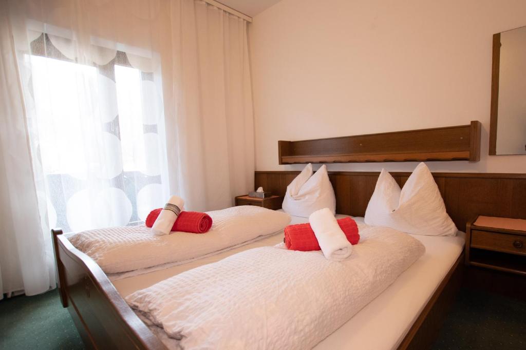 Postel nebo postele na pokoji v ubytování Hotel Vanda
