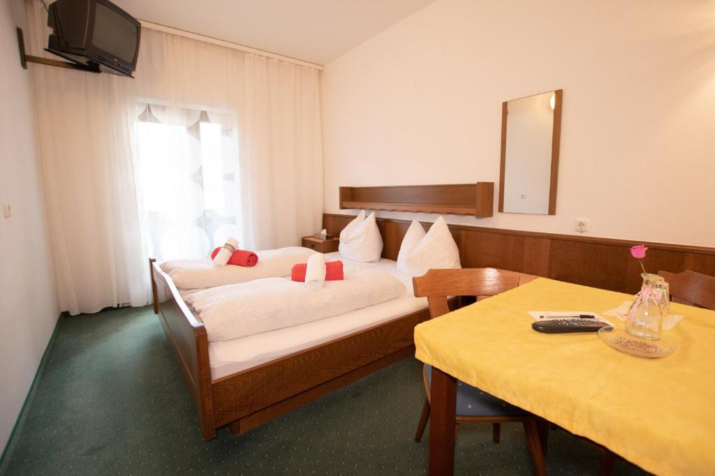 Postel nebo postele na pokoji v ubytování Hotel Vanda