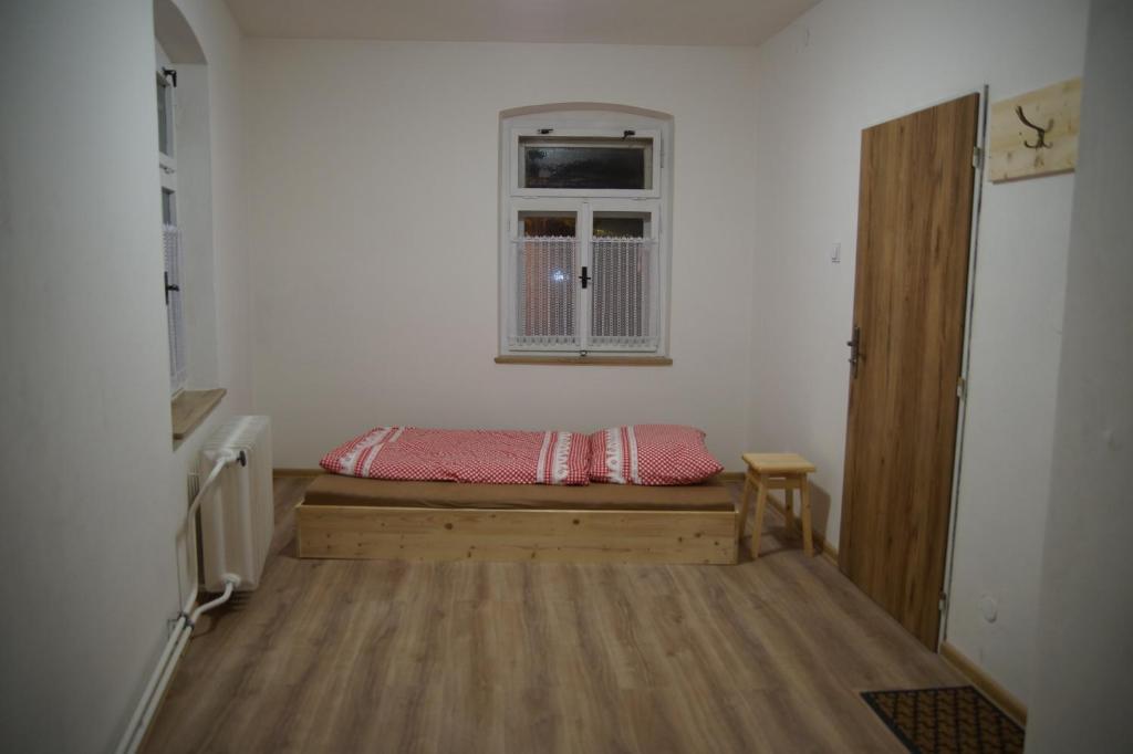 Postel nebo postele na pokoji v ubytování U Broučků