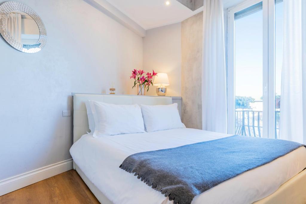 Кровать или кровати в номере Milan Retreats