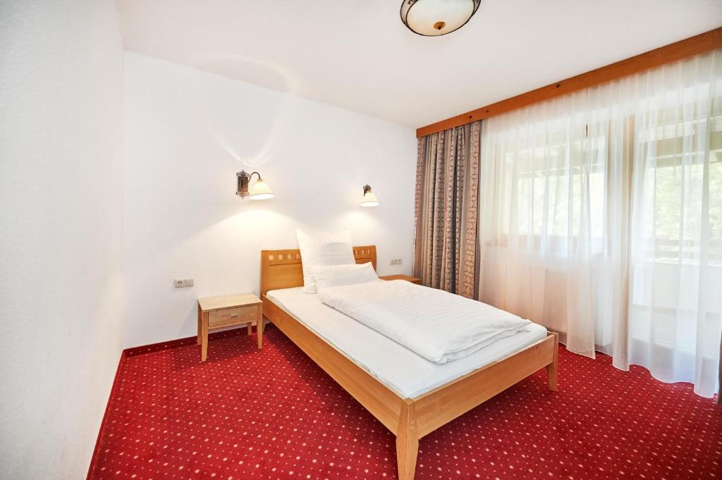 Posteľ alebo postele v izbe v ubytovaní Hotel ZUM STERNENHOF
