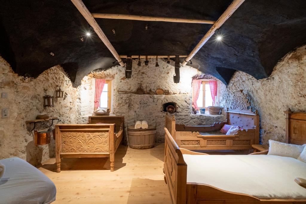 Postel nebo postele na pokoji v ubytování Hotel Crusch Alba Sta Maria