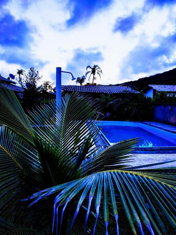  Casa de campo com piscina na praia em Mariscal-SC - um refúgio