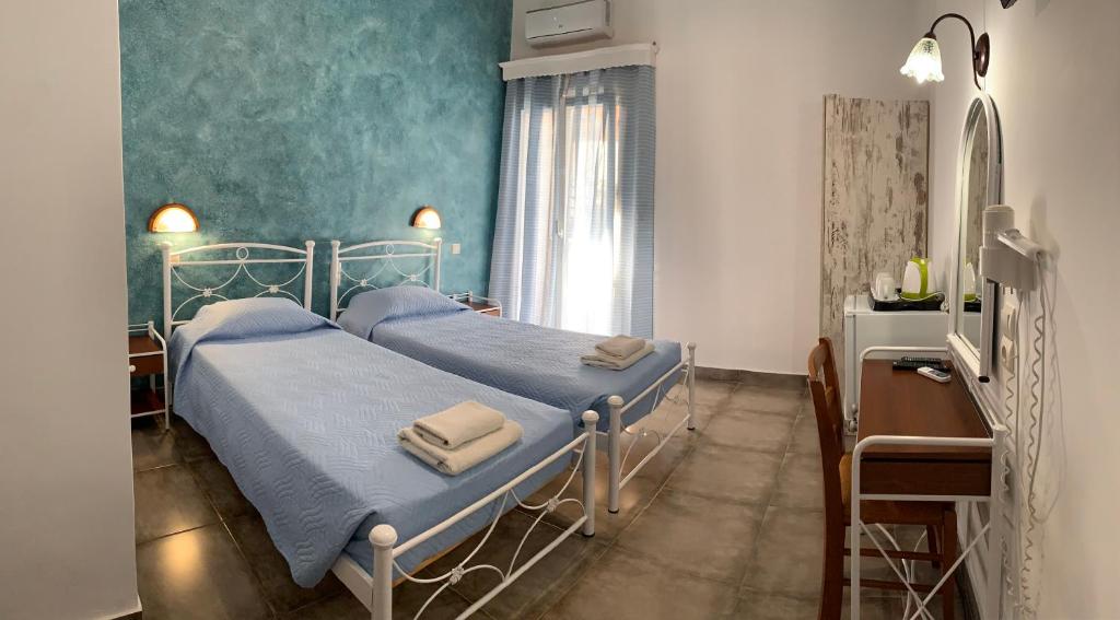 Postel nebo postele na pokoji v ubytování Villa Ilios