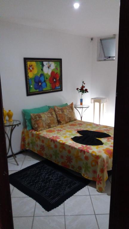 Säng eller sängar i ett rum på CASACOMPART itapuã