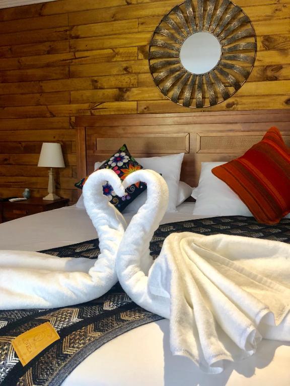Postel nebo postele na pokoji v ubytování Refugio del Maipo Lodge
