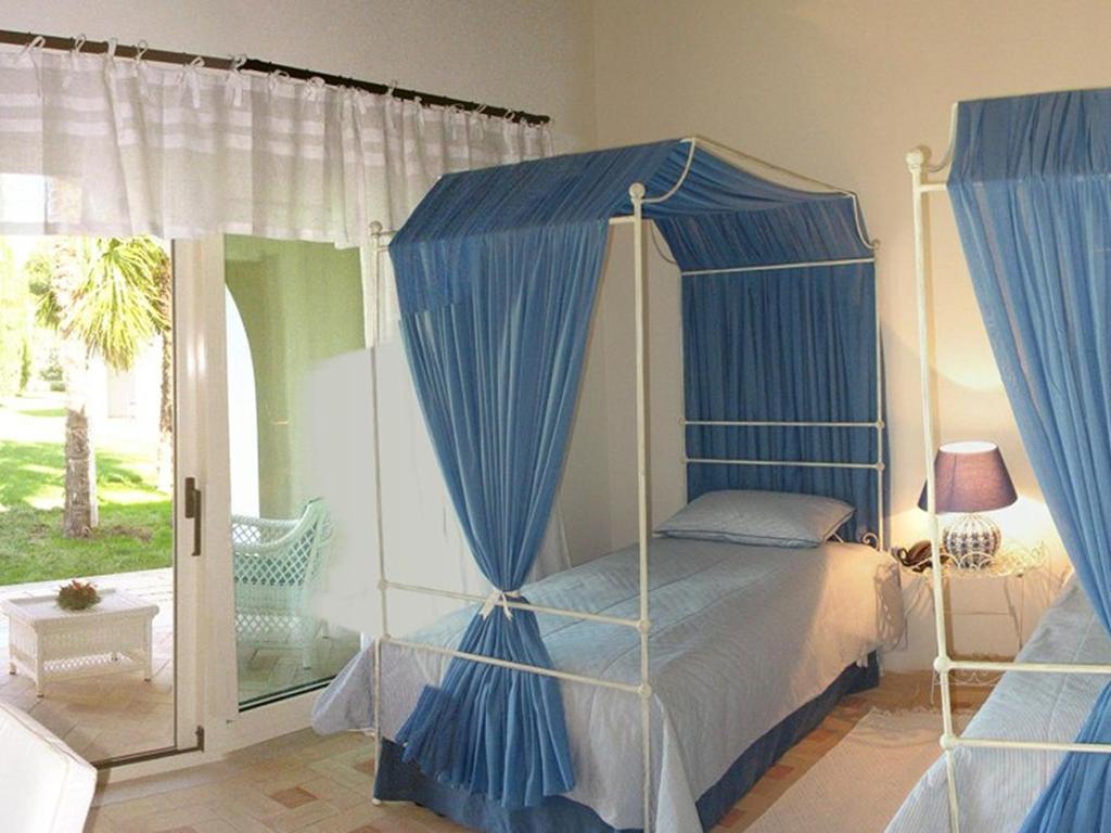 Ένα ή περισσότερα κρεβάτια σε δωμάτιο στο Casa Freda