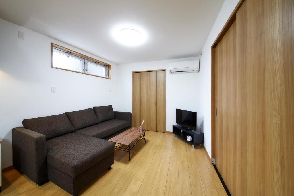 Posezení v ubytování おやど紀伊国屋本石灰町