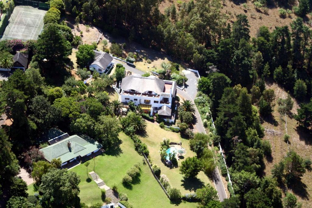 an aerial view of a house with a yard at De Molen Guest House in Somerset West