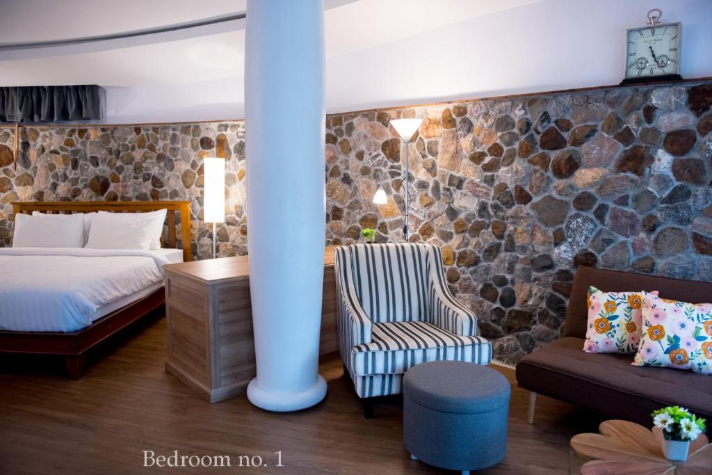 Postel nebo postele na pokoji v ubytování Koh Mak Cococape Resort