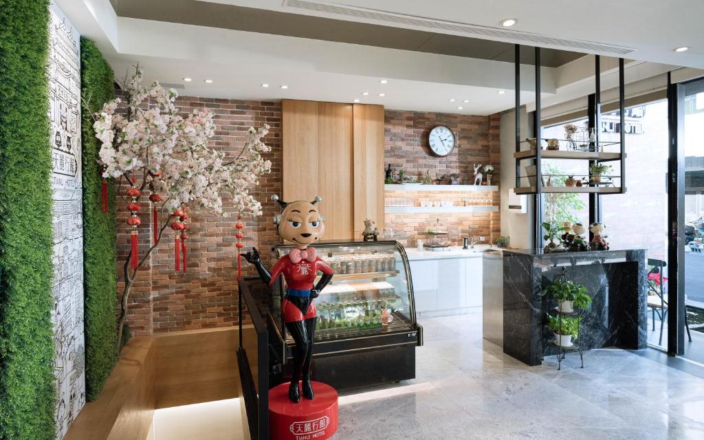 Kuchyň nebo kuchyňský kout v ubytování Tianli Hotel
