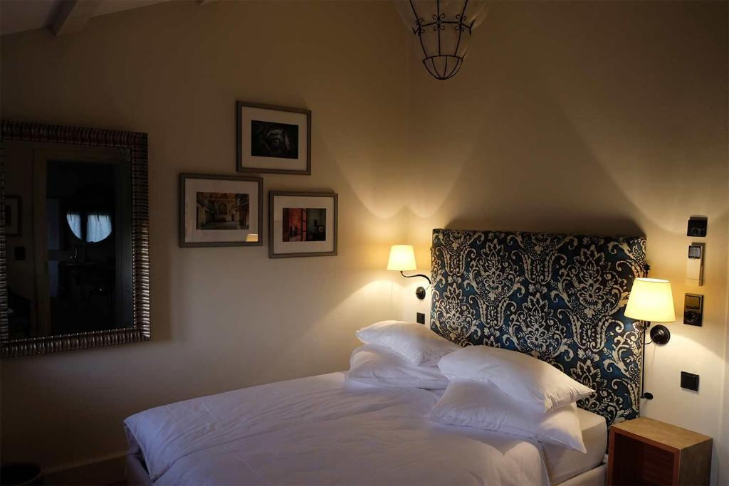 Postel nebo postele na pokoji v ubytování Foscari the fine b&b