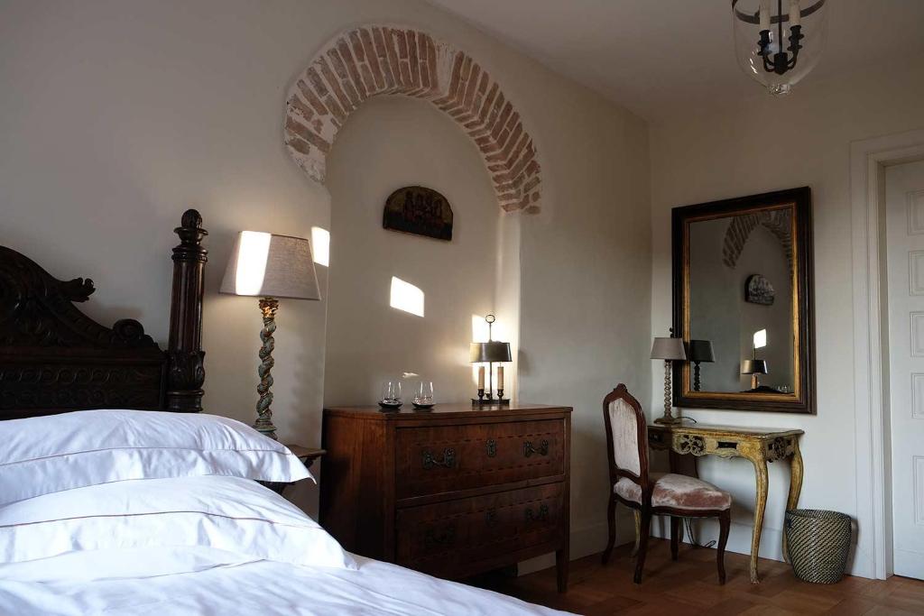 Postel nebo postele na pokoji v ubytování Foscari the fine b&b