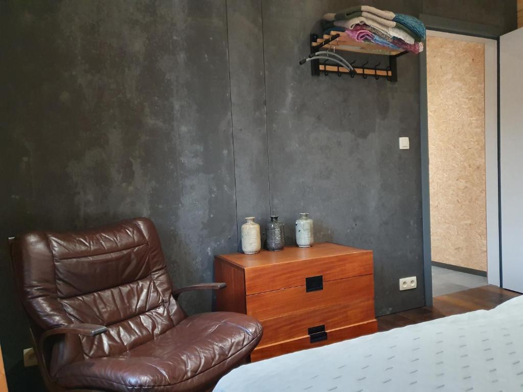 Postel nebo postele na pokoji v ubytování Vue sur Meuse