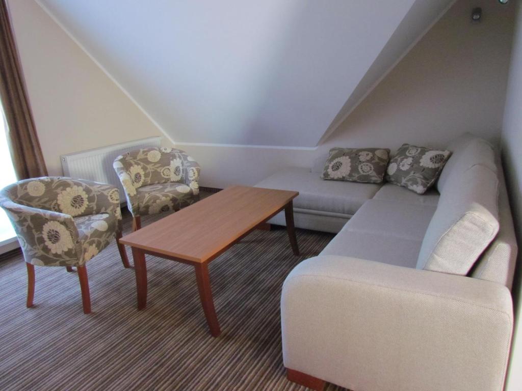 Posezení v ubytování Hotel Encian