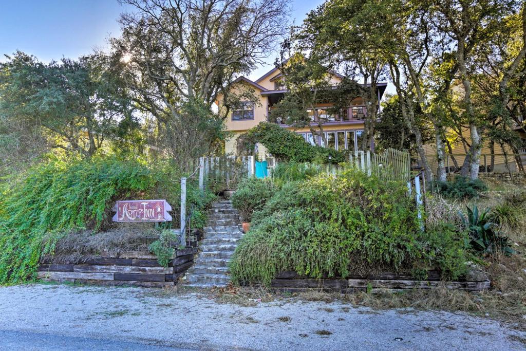 a house with a sign that says yard at Exotic Home with Patio and Grill Walk to Canyon Lake! in Canyon Lake