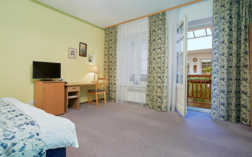 TV a/nebo společenská místnost v ubytování Angel Town Hall Apartments
