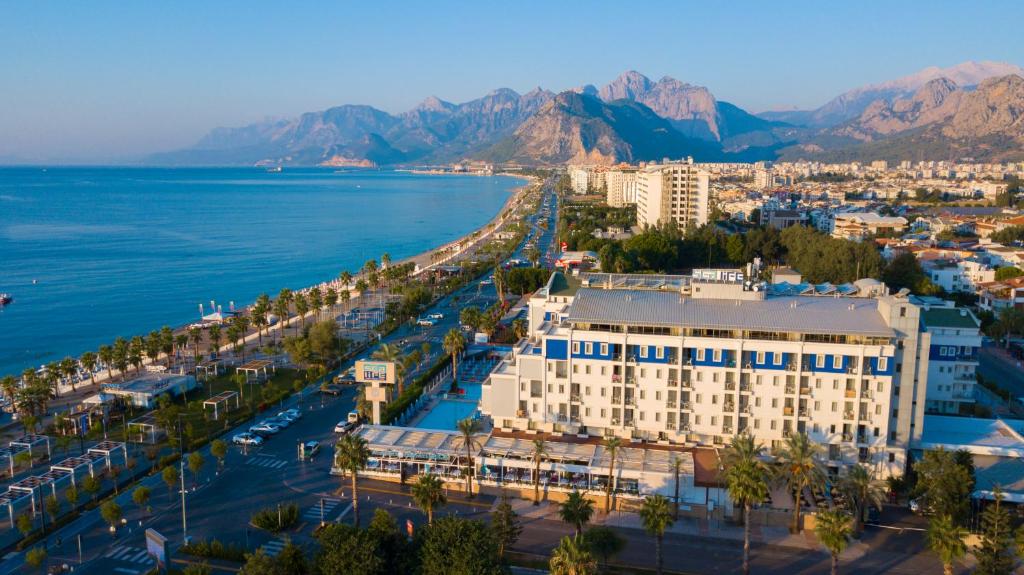 an aerial view of a city and the ocean at Sealife Family Resort Hotel in Antalya