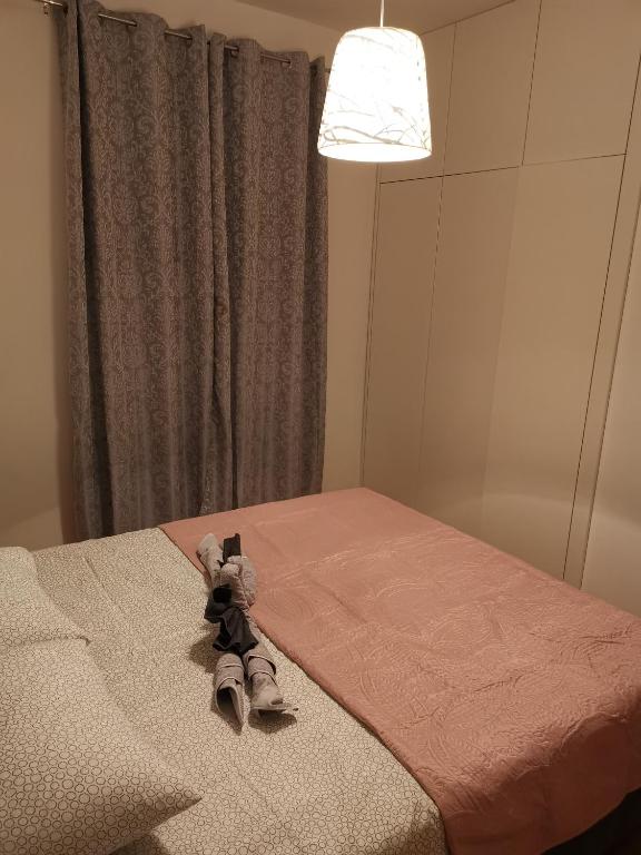 Postel nebo postele na pokoji v ubytování Apartmani "Mary"