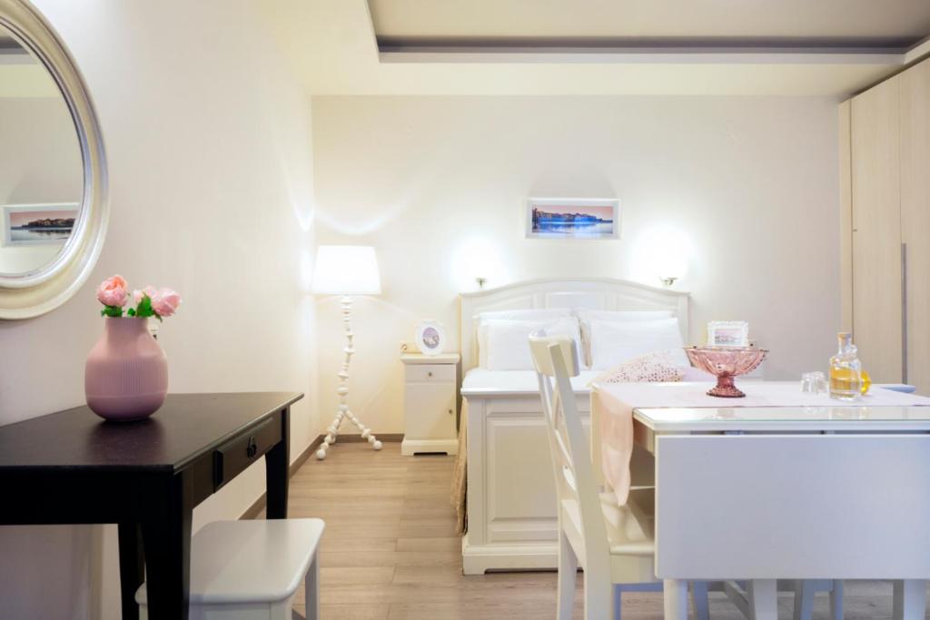 Postel nebo postele na pokoji v ubytování Casa Del Porto