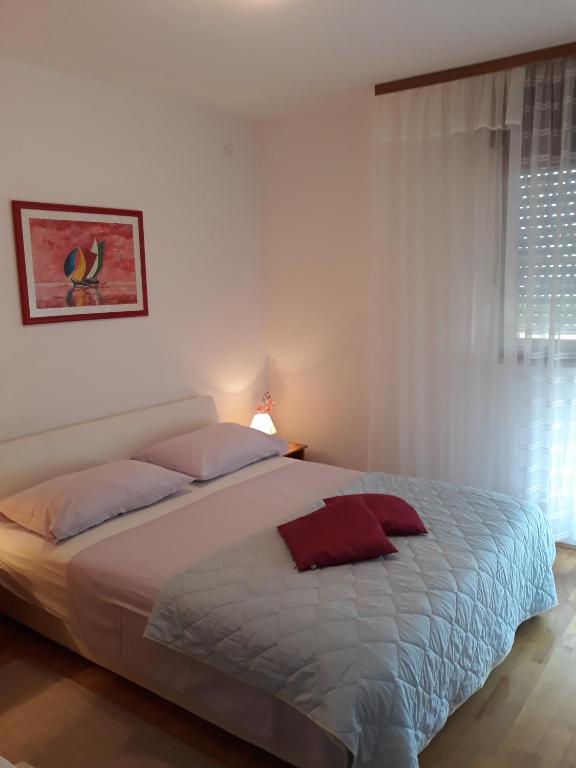 Postel nebo postele na pokoji v ubytování Villa Calypso