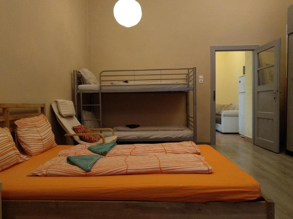 Postel nebo postele na pokoji v ubytování HoBar Hostel
