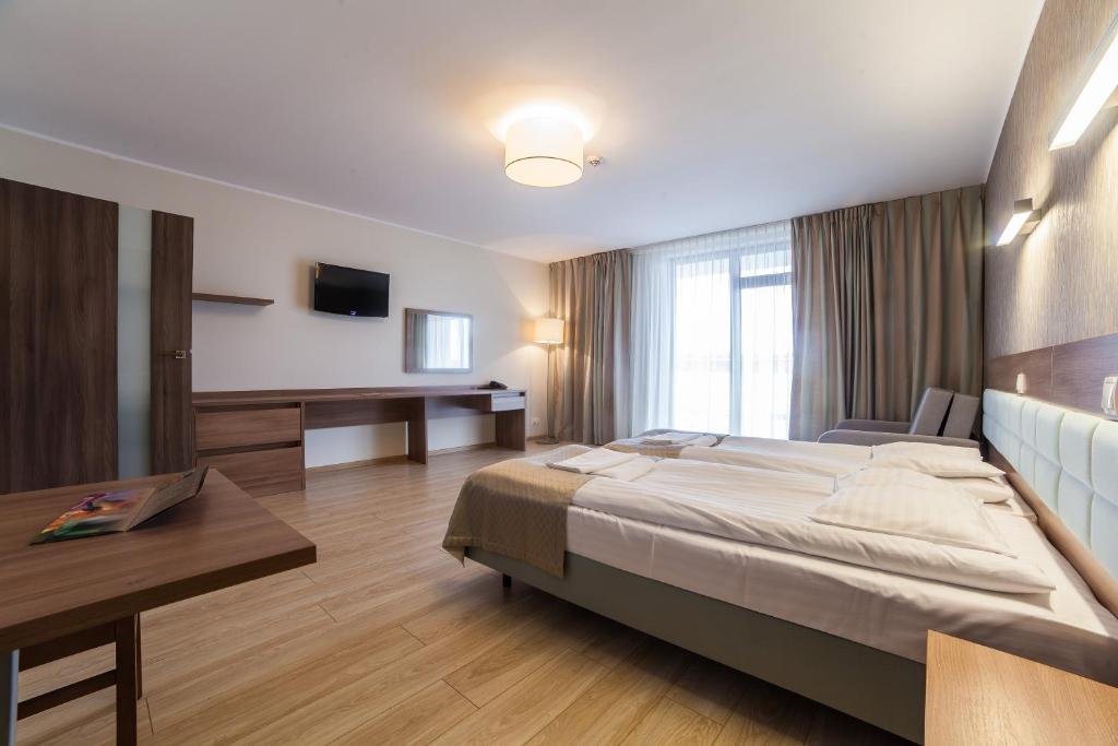 Postel nebo postele na pokoji v ubytování Olymp 3