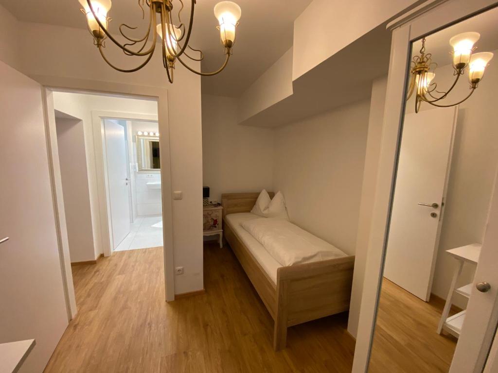 Postel nebo postele na pokoji v ubytování Ferienapartement Liebling