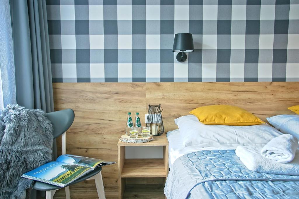 Postel nebo postele na pokoji v ubytování Apartamenty Magia Gór
