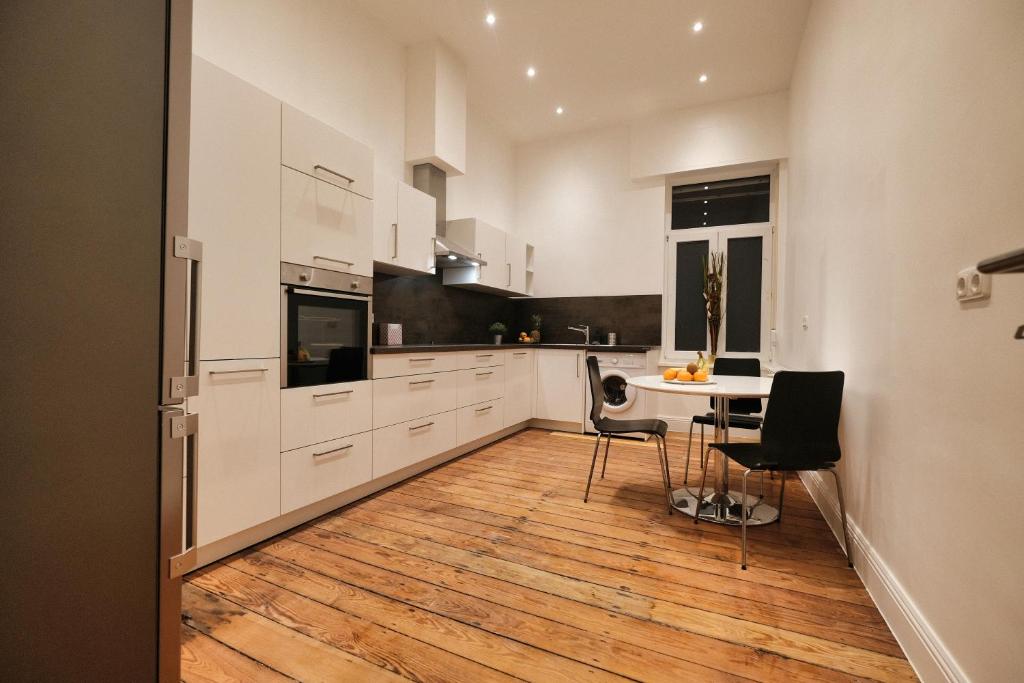 Η κουζίνα ή μικρή κουζίνα στο Appartement Deluxe, Monteurwohnung
