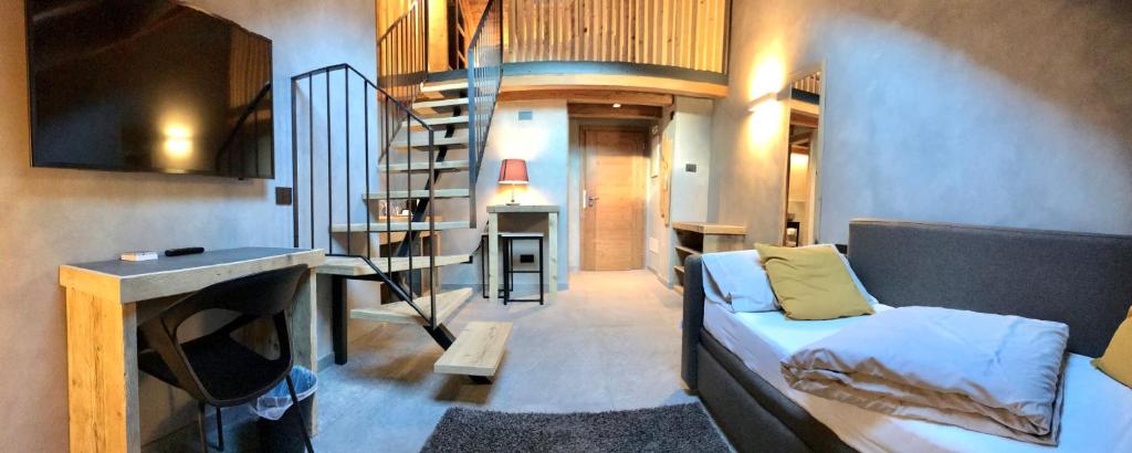 TV a/nebo společenská místnost v ubytování Hotel san Vitale