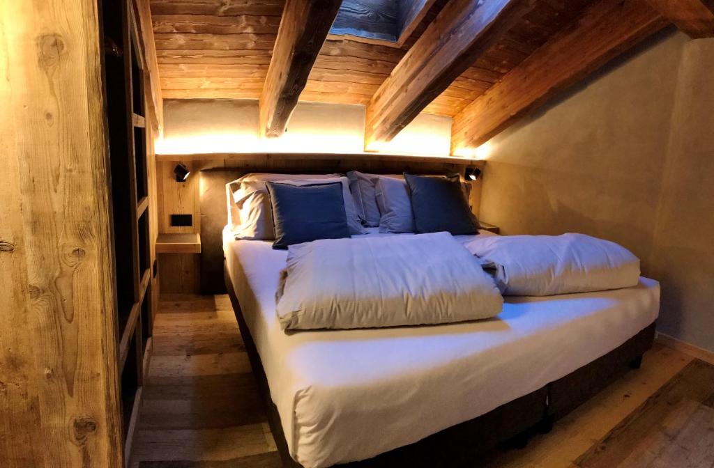 
Łóżko lub łóżka w pokoju w obiekcie Hotel san Vitale
