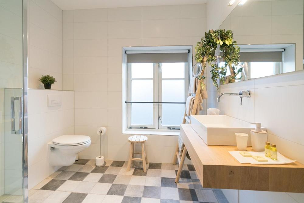 Koupelna v ubytování B&B De Dorpshoeve