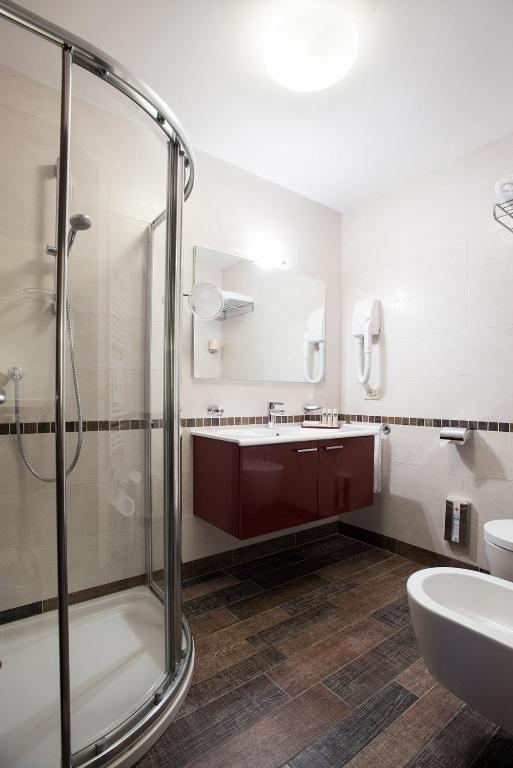 Ванная комната в Aparthotel Holiday
