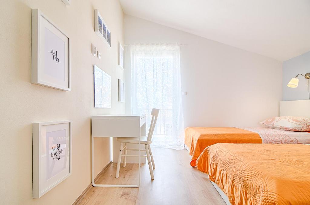 Postel nebo postele na pokoji v ubytování Jasna House