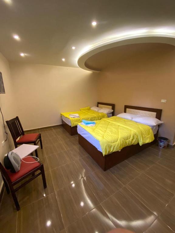 Letto o letti in una camera di Makadi Pyramids View