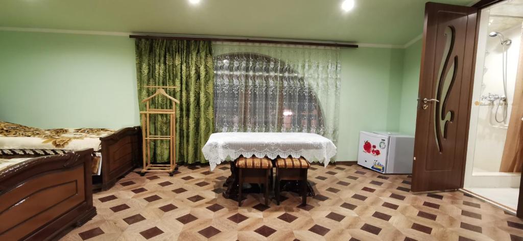 Postel nebo postele na pokoji v ubytování Hotel Halidzor