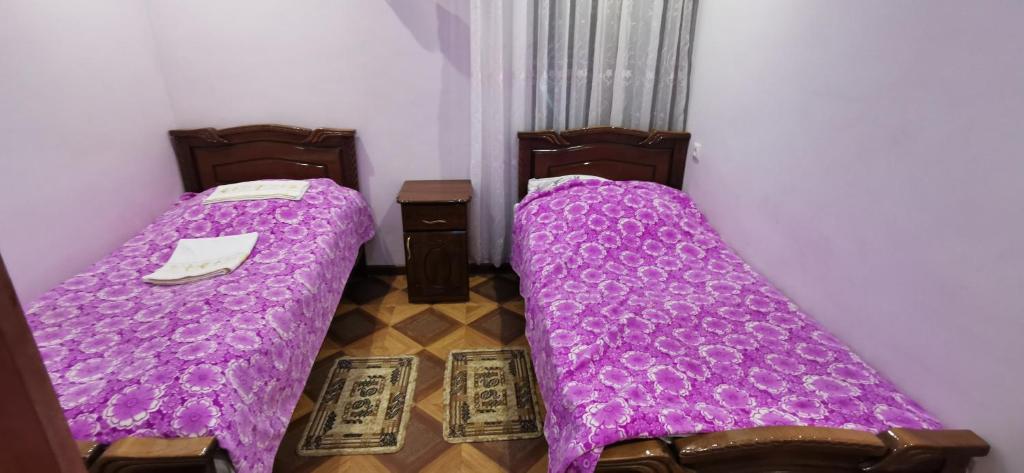 Postel nebo postele na pokoji v ubytování Hotel Halidzor