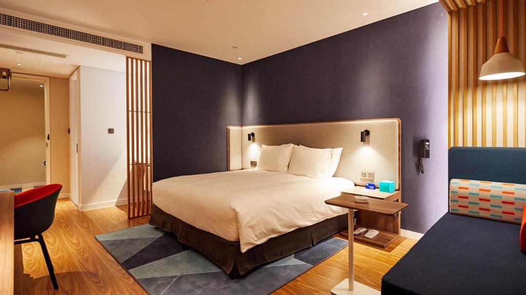 Postel nebo postele na pokoji v ubytování Holiday Inn Express Shijiazhuang High-tech Zone by IHG