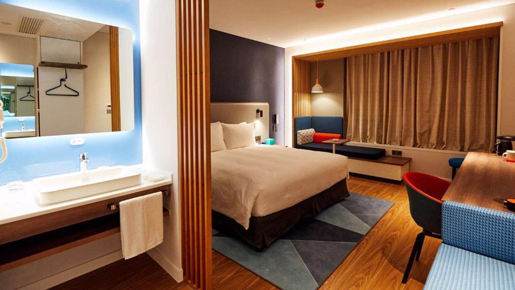 Postel nebo postele na pokoji v ubytování Holiday Inn Express Shijiazhuang High-tech Zone by IHG