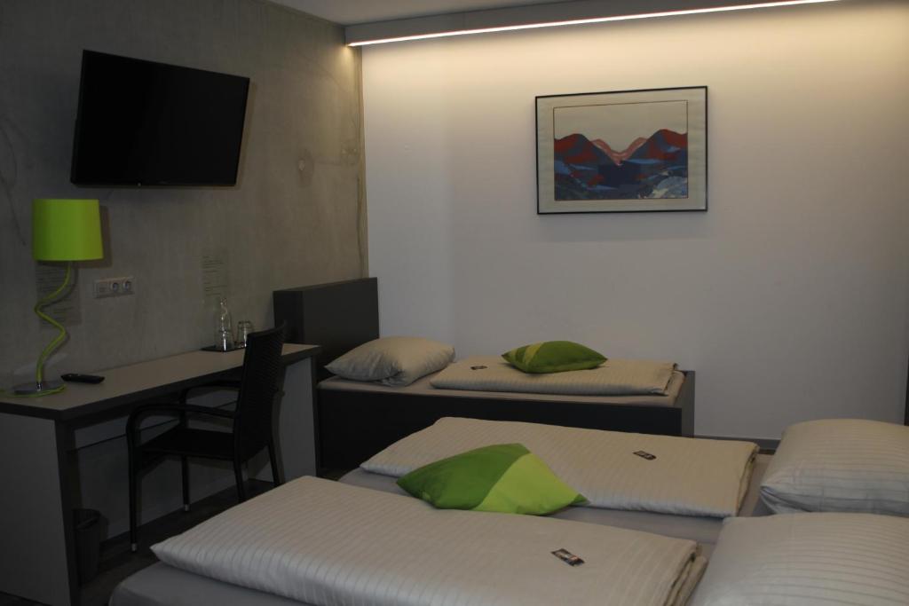 TV a/nebo společenská místnost v ubytování Hotel Eulensteins