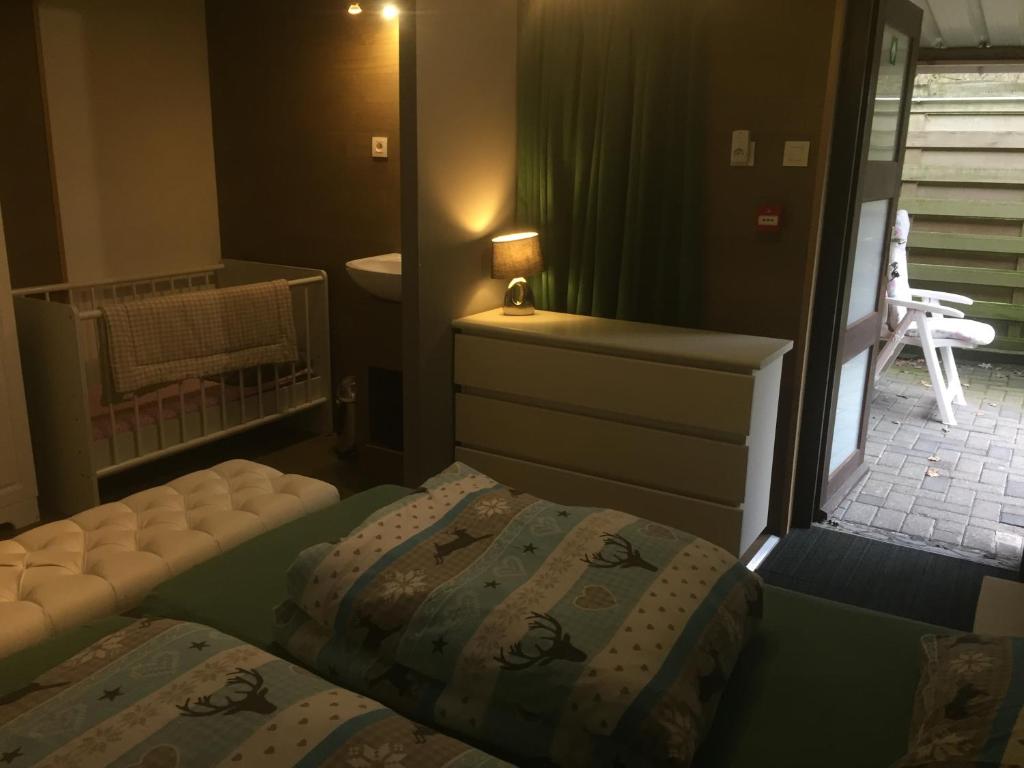 Postel nebo postele na pokoji v ubytování de bron