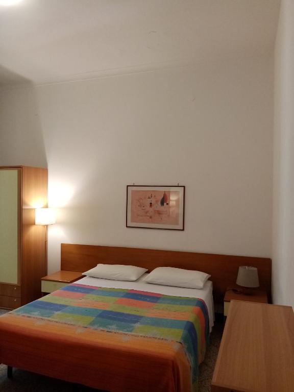 Postel nebo postele na pokoji v ubytování Ariston Petit Hotel