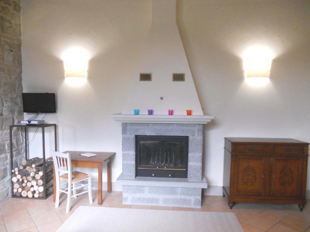 Televízia a/alebo spoločenská miestnosť v ubytovaní L'Orangerie