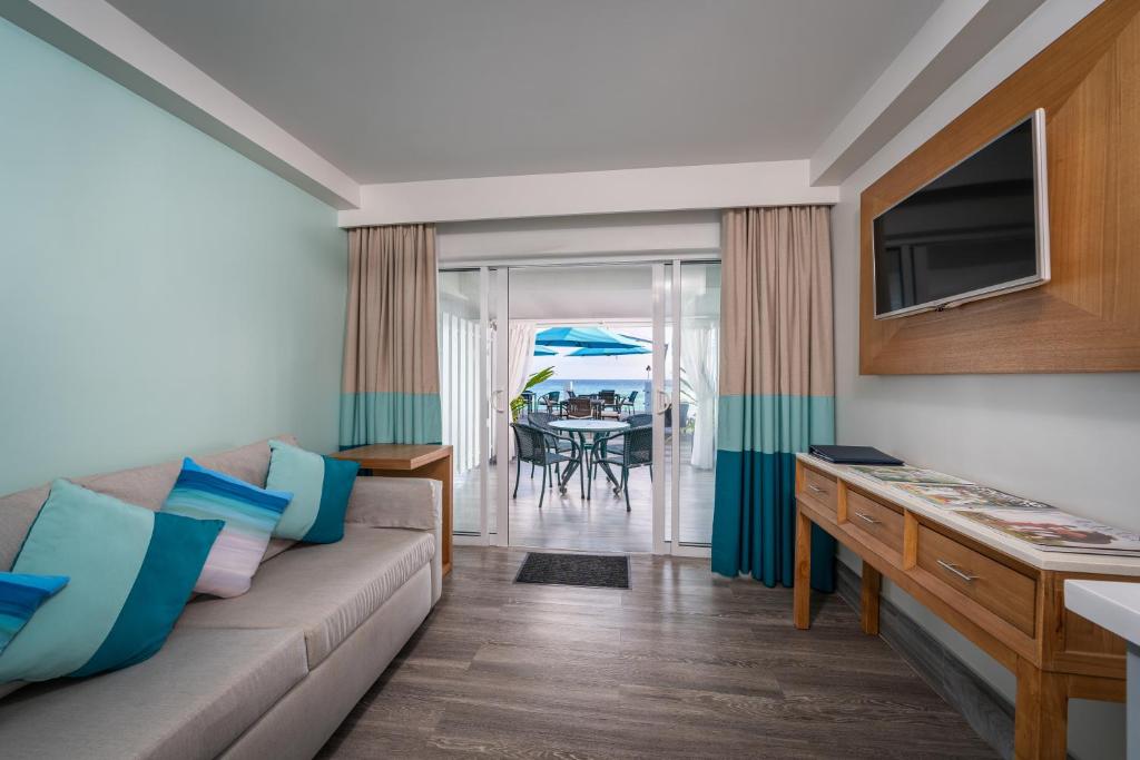 TV a/nebo společenská místnost v ubytování South Gap Hotel